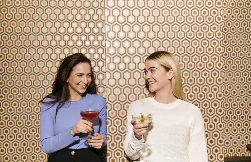 Ladies enjoying cocktails at The Queens Hotel
