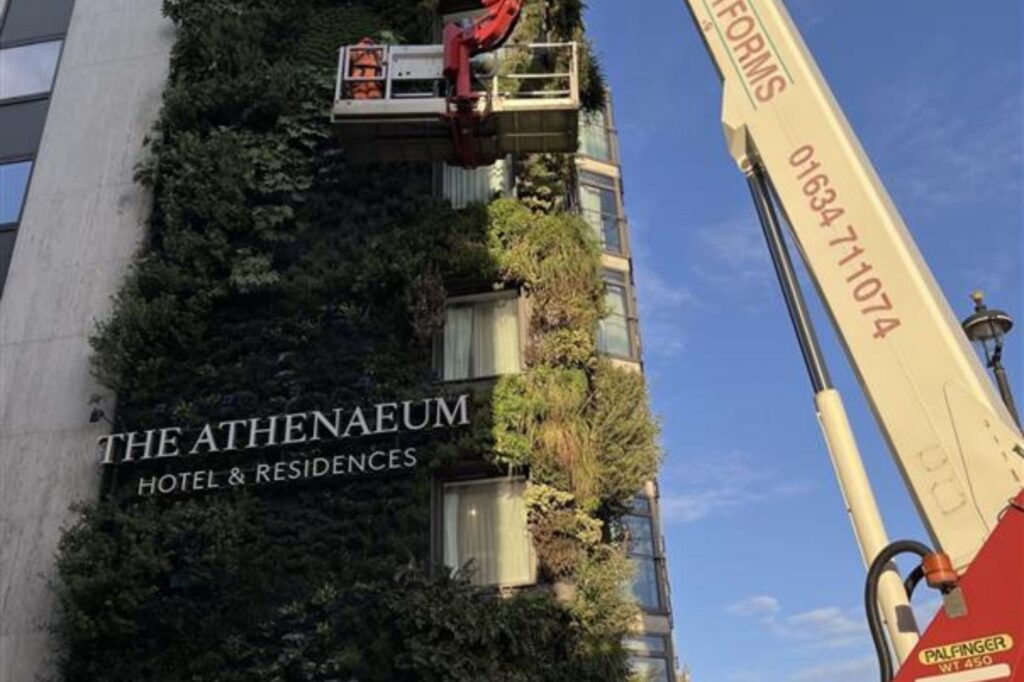 The Athenaeum Hotel and Residences exterior and living wall.