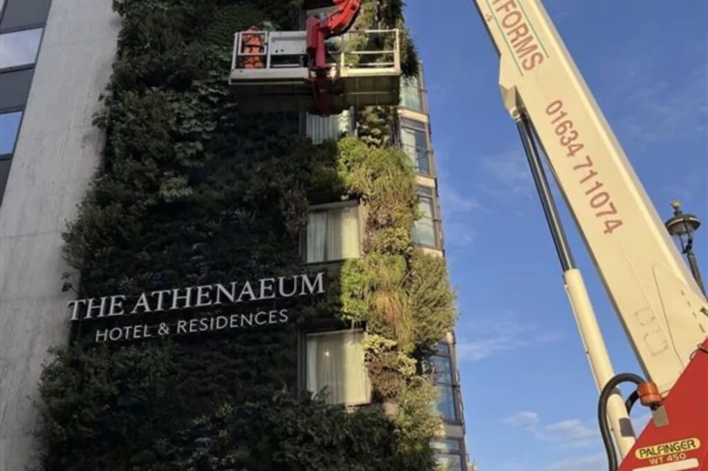 The Athenaeum Hotel and Residences exterior and living wall.